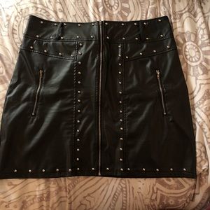 Black faux leather skirt with studs
